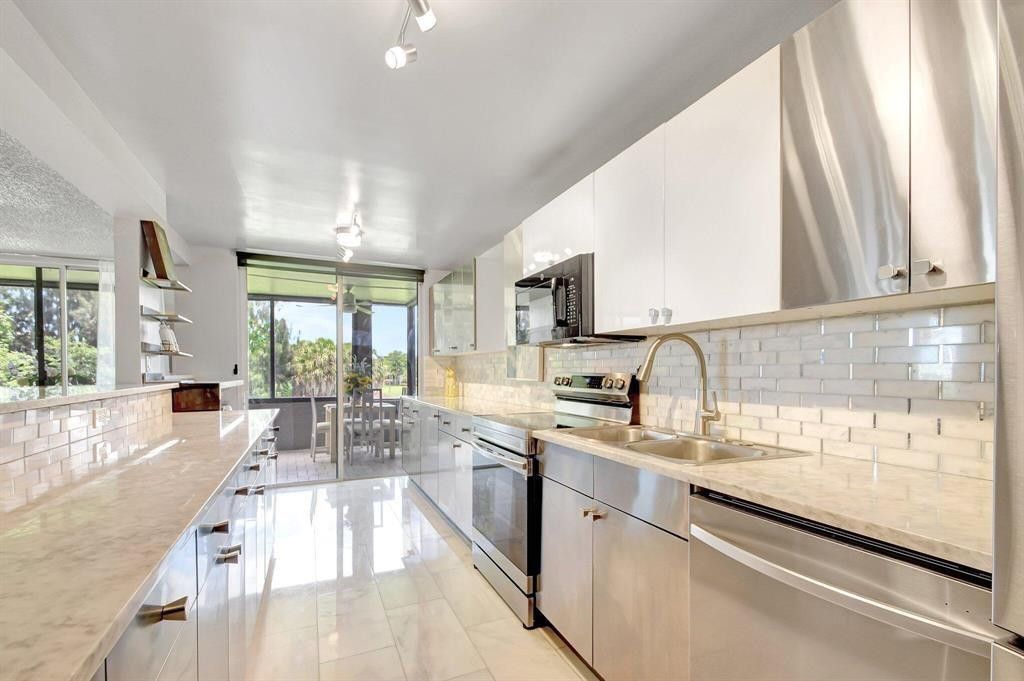 Photo of 4770 Fountains Drive #304, Lake Worth, FL 33467 (MLS # F10541999)