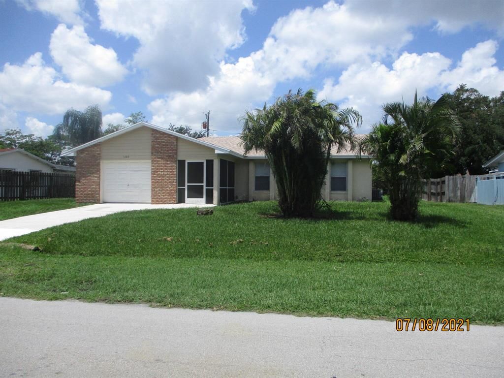Photo of 1482 SE Santurce Road, Port Saint Lucie, FL 34952 (MLS # R10729936)