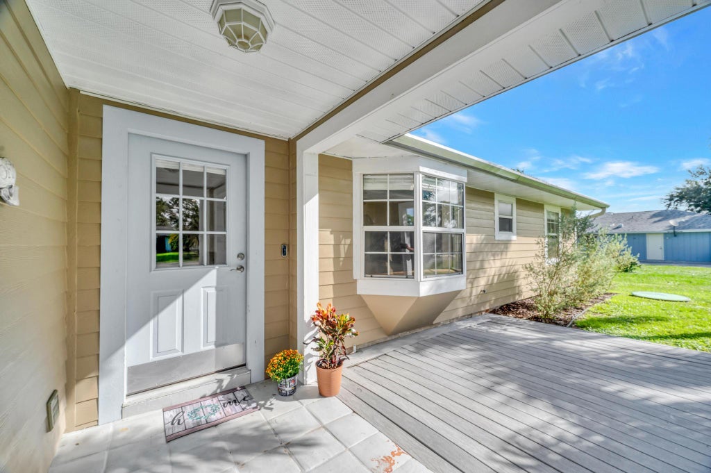 Photo of 225 SE Ray Avenue, Port Saint Lucie, FL 34983 (MLS # R11028447)