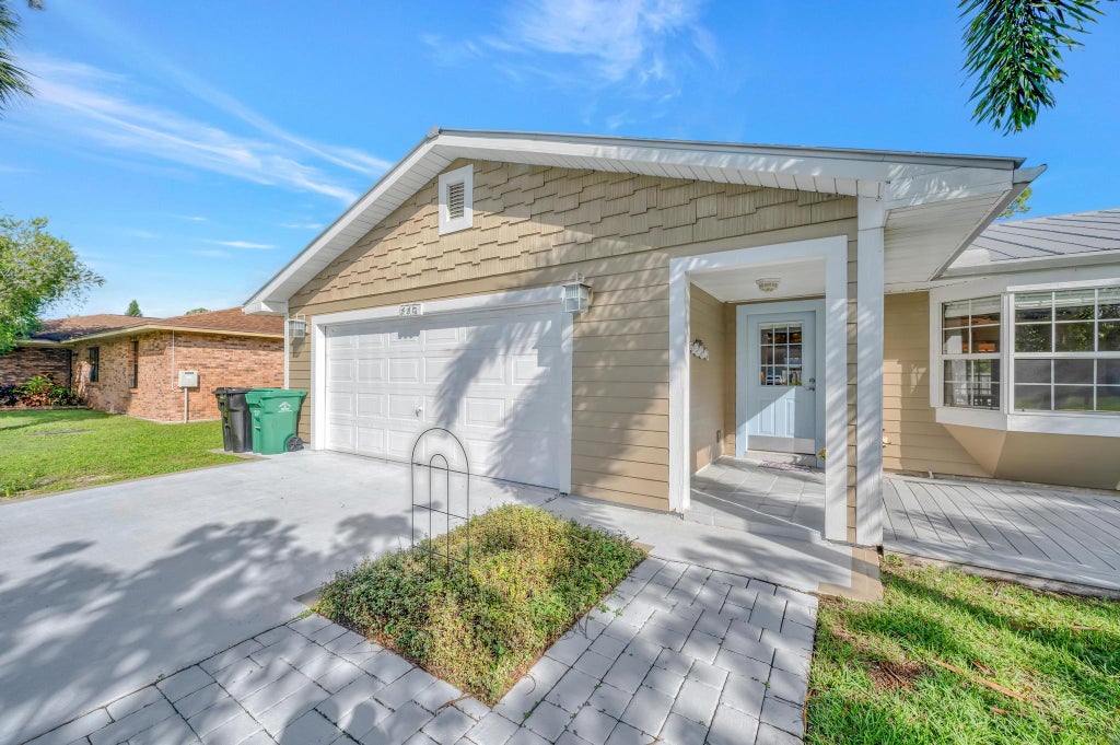 Photo of 225 SE Ray Avenue, Port Saint Lucie, FL 34983 (MLS # R11028447)