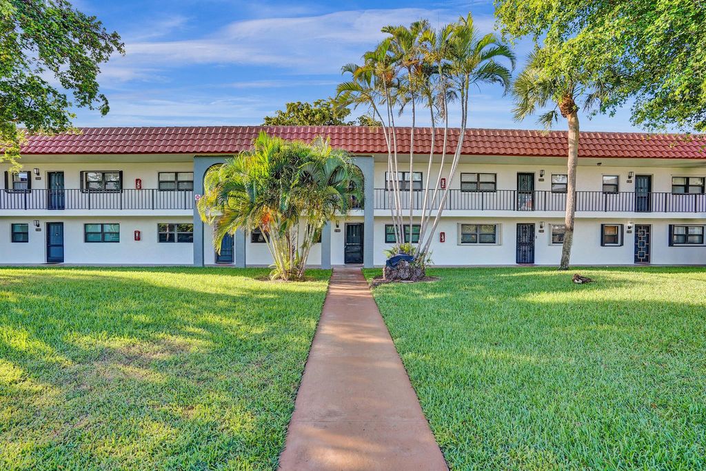 Photo of 1981 W Woolbright Road #E104, Boynton Beach, FL 33426 (MLS # R11102797)