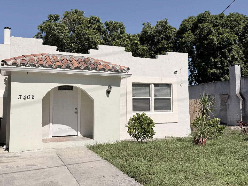 Photo of 3402 Greenwood Avenue, West Palm Beach, FL 33407 (MLS # B26060602)