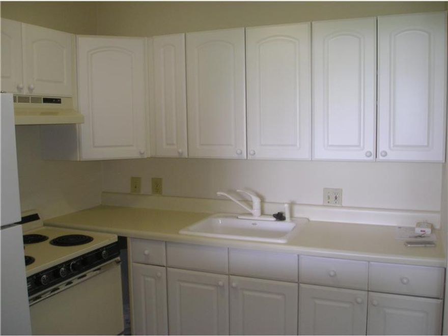 Beautifully redone 1 bedroom/ 1 bath condo located in Preston B in guard gated Century Village. Kitchen cabinets are newer and we offer new bath components and newer carpet. There is a beautiful lake view from your living room. Century Village offers an incomparable active adult lifestyle. Theatre, indoor pool, exercise room, multi-purpose rooms, tennis courts and enough activities to keep you occupied daily. The community also offers bus service to a variety of locations. Easy access to all.