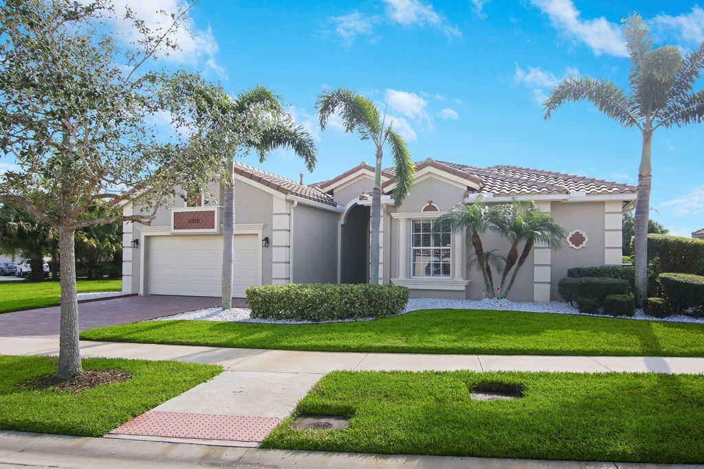 Photo of 11719 SW Apple Blossom Trail, Port Saint Lucie, FL 34987 (MLS # R10773488)