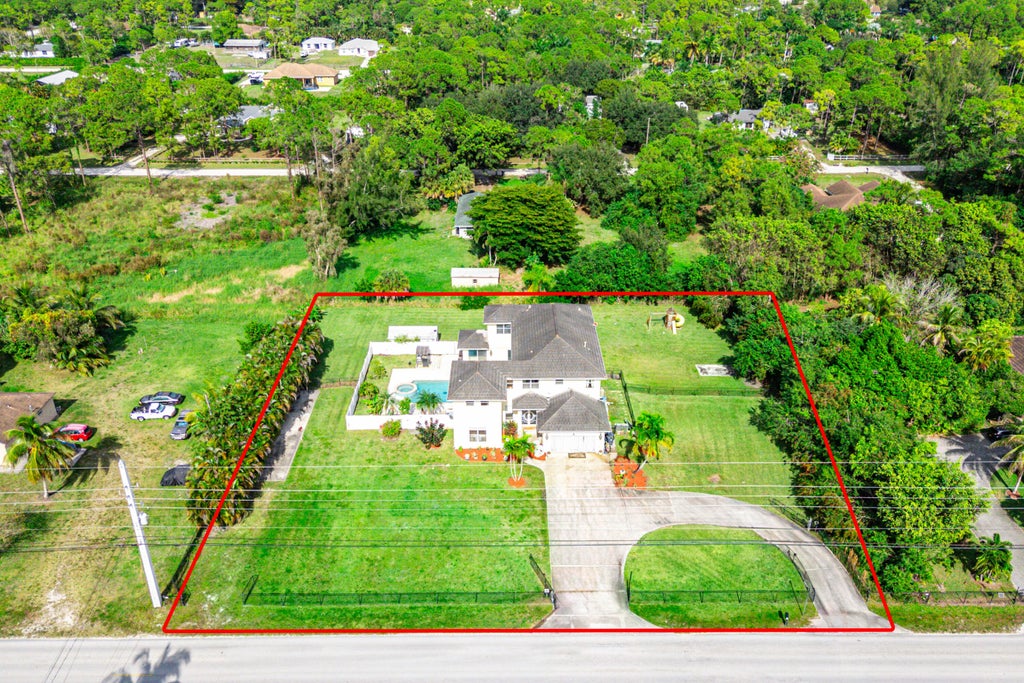 Photo of 17371 W Sycamore Drive, The Acreage, FL 33470 (MLS # R11152224)
