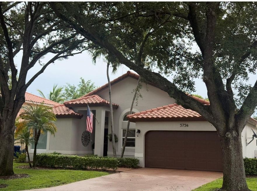 !!! Incredible Price !!! Stunning 3BD/2BA pool home in The Arbors, offered at $698,888 and packed with upgrades! NEW impact windows & doors (2025), A/C (2023), heated pool, a gorgeous barrel tile roof, vaulted ceilings, and updated bathrooms. The oversized driveway leads to an open-concept floor plan with tranquil pool views. The gourmet kitchen features nice appliances, quartz countertops, and custom cabinetry—perfect for culinary enthusiasts. Remodeled baths with seamless glass showers add elegance. A pristine garage offers flexible living options. Outdoors, enjoy your private oasis with an extended screened patio and pool area—ideal for gatherings. Priced for a fast sale—this one won’t last!**