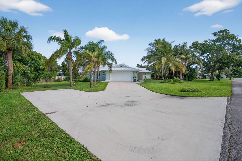 Photo of 5273 SE Tall Pines Way, Stuart, FL 34997 (MLS # R11130340)