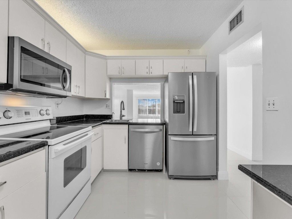 Photo of 3000 NW 42nd Avenue #B408, Coconut Creek, FL 33066 (MLS # F10544813)