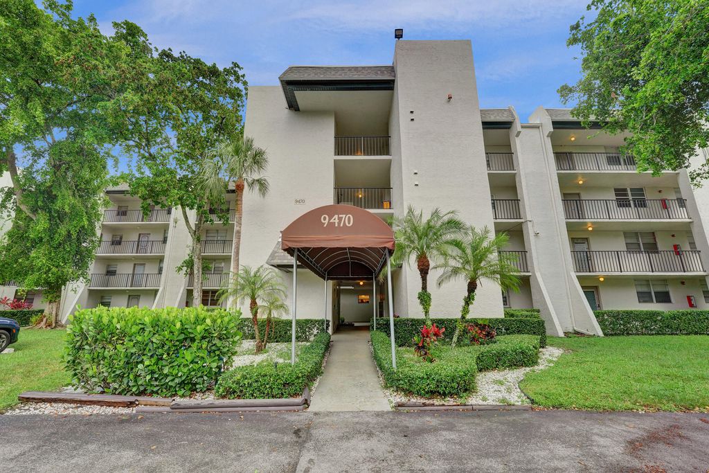Photo of 9470 Poinciana Place #308, Davie, FL 33324 (MLS # B26005079)
