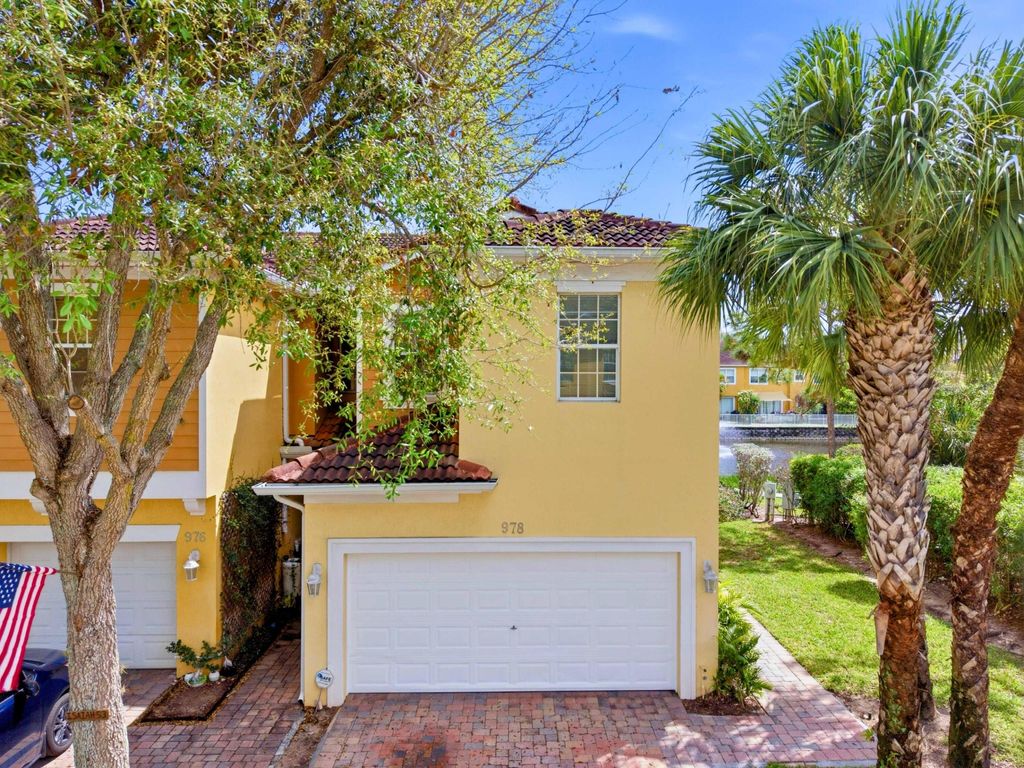 Photo of 978 Pipers Cay Drive, West Palm Beach, FL 33415 (MLS # B26008245)