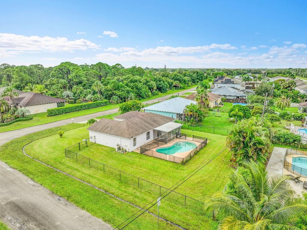 Photo of 3789 SW Haines St, Port Saint Lucie, FL 34953 (MLS # R11129527)