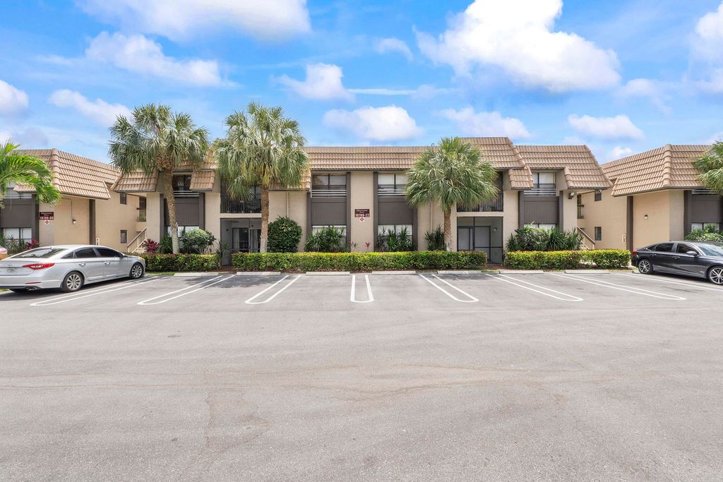 Photo of 10710 Royal Palm Boulevard #2-2, Coral Springs, FL 33065 (MLS # B26016752)