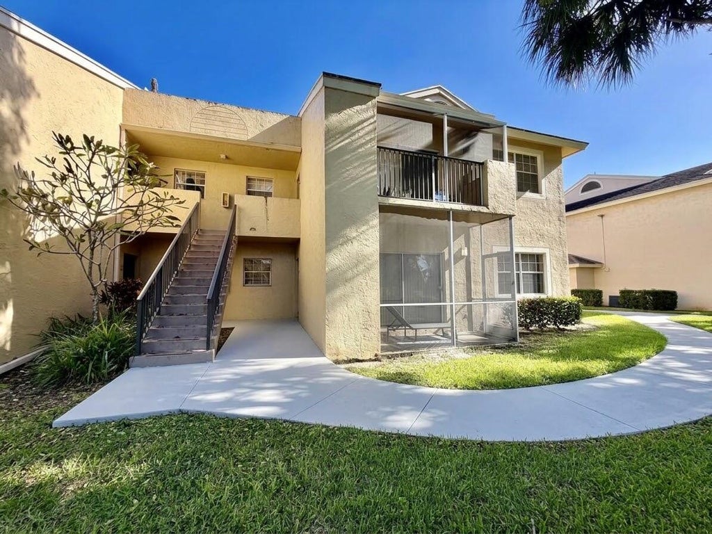Photo of 661 Cypress Club Way #F, Deerfield Beach, FL 33064 (MLS # B26092968)