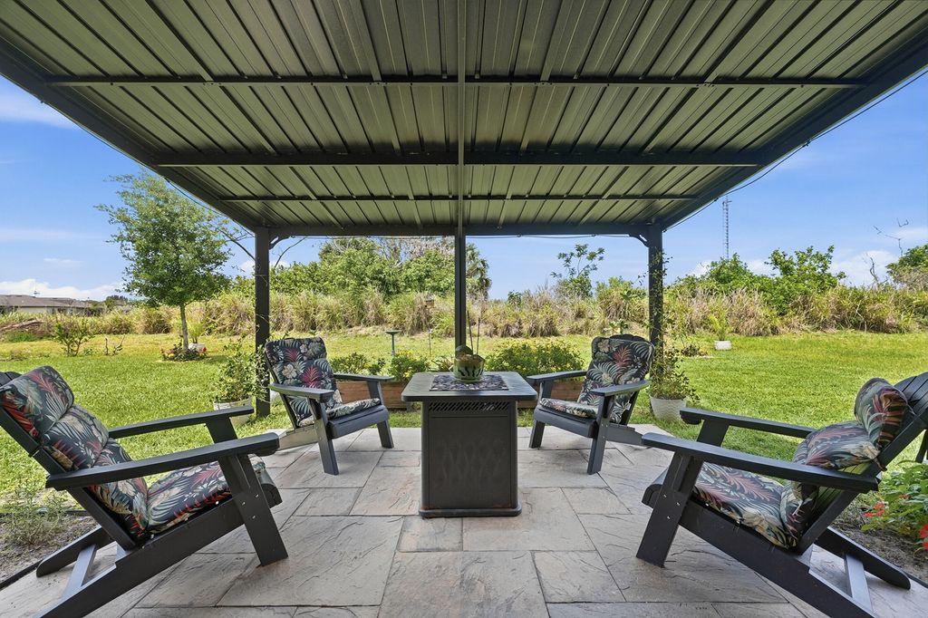 Photo of 5240 Imagination Drive, Fort Pierce, FL 34947 (MLS # B26016929)