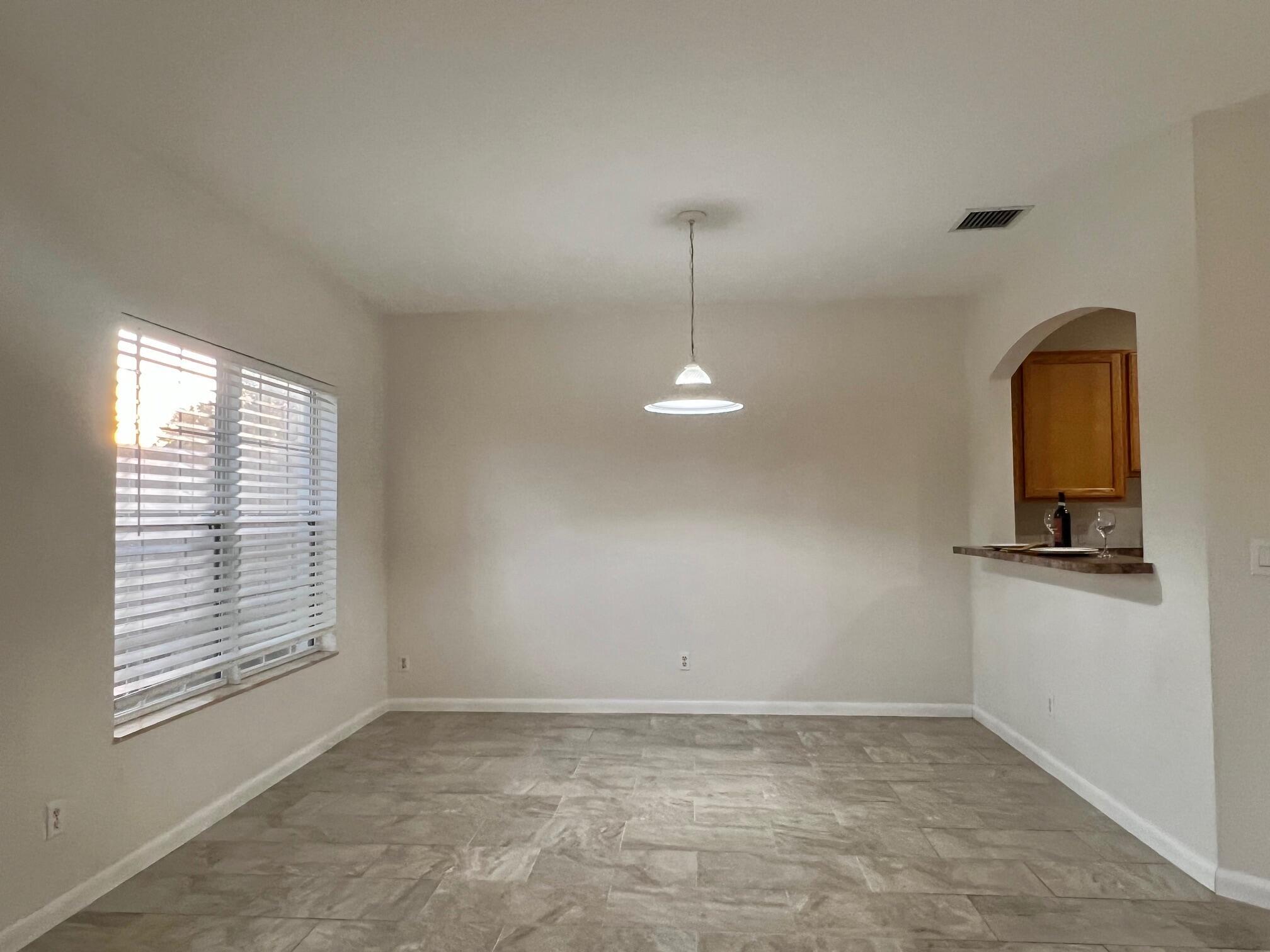 4406 NE Windmill Palm Way