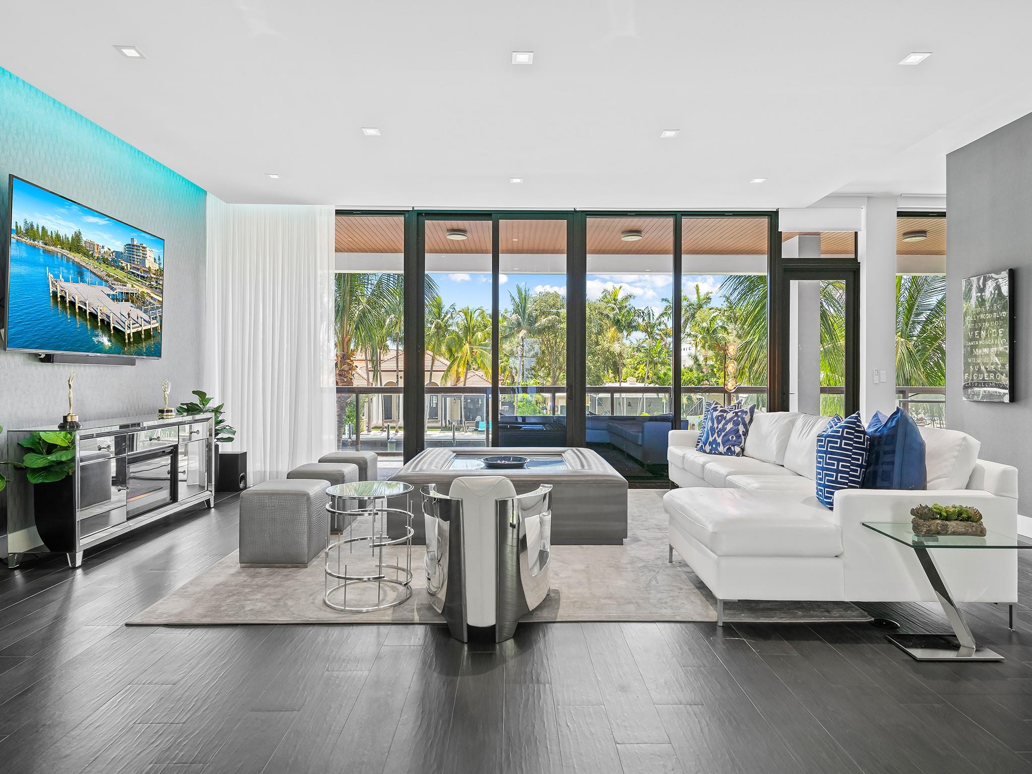 Welcome to Aqualuna 201 in the heart of Downtown Fort Lauderdale off Las Olas Blvd. With over 3100 sqft of living space, this 3 bedroom, 3 bathroom corner unit features a private elevator and foyer entrance, porcelain tile floors throughout an open concept, a chef‘s kitchen featuring Wolf stove, Subzero appliances, quartz countertops, a wet bar, and fabulous water views from its floor-to-ceiling impact glass windows and oversized wraparound terrace. Spacious bedrooms with luxurious en suites, walk-in closets, and terrace access. 2 covered parking spaces, gym, pool and boat slip.