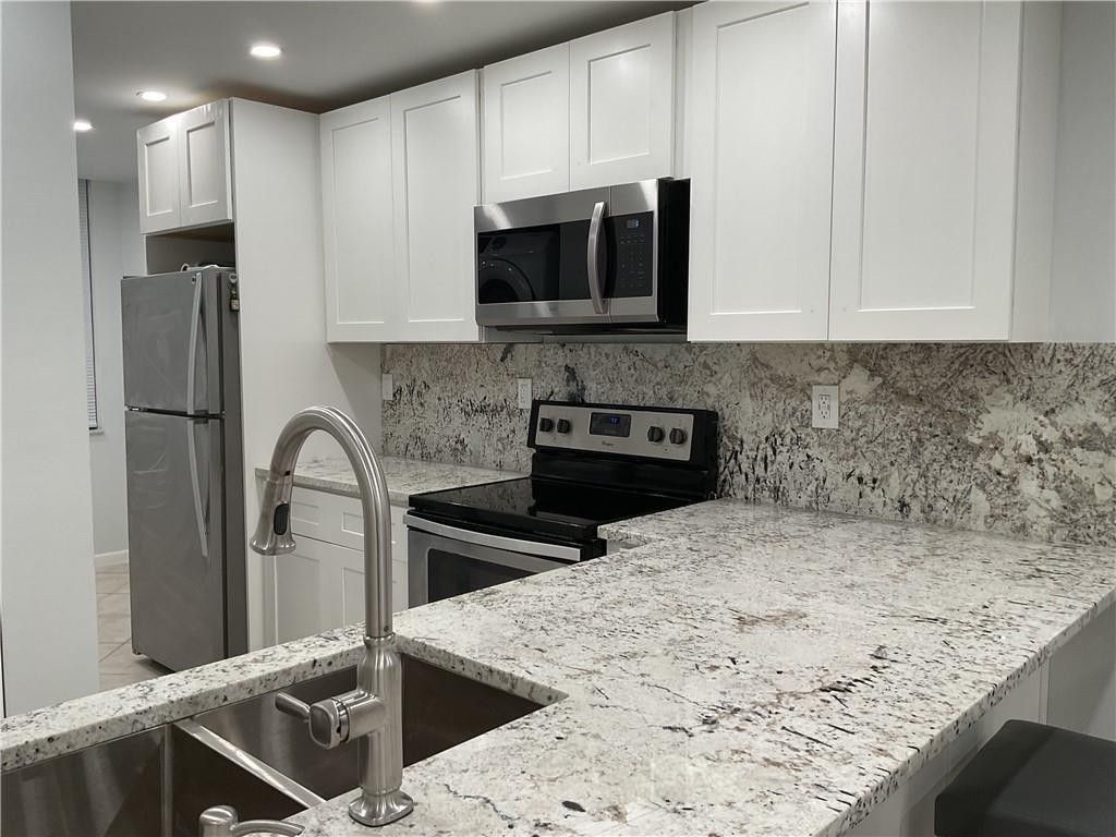 Photo of 6800 Cypress Road #208, Plantation, FL 33317 (MLS # F10505046)