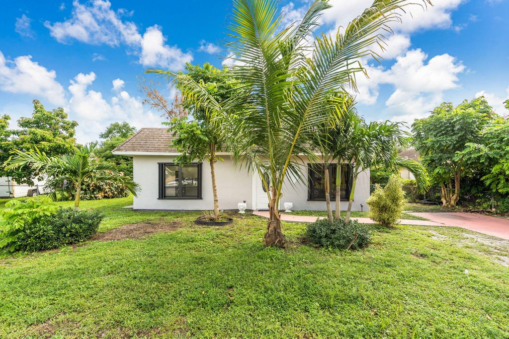 Photo of 228 Martin Avenue, Greenacres, FL 33463 (MLS # R11131252)