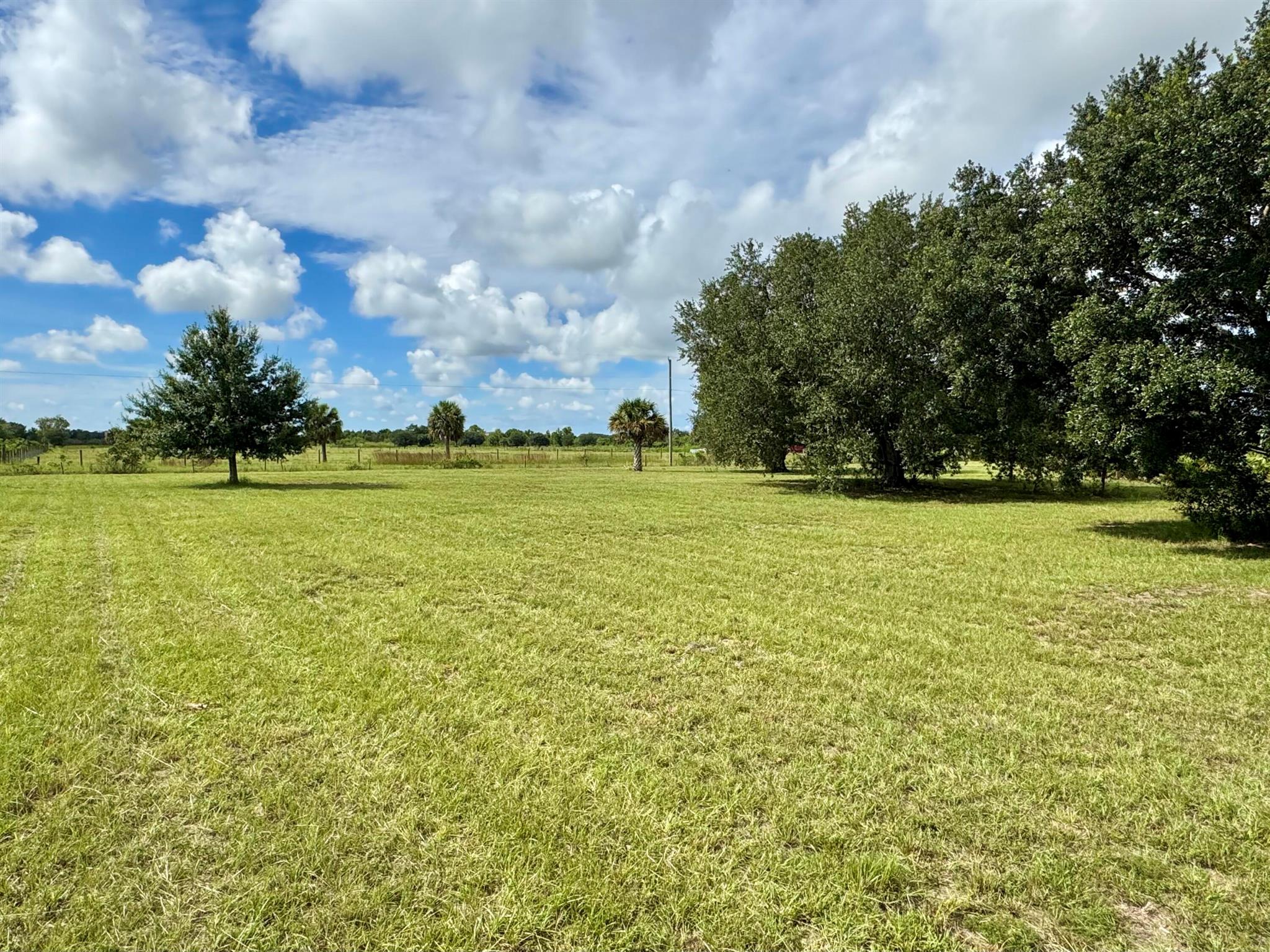 Viking/Prairie  2.5-acre parcel . This lot offers a great opportunity for a homesite, manufactured home placement, or recreational use. With no HOA and plenty of open space, it's ideal for agricultural activities, livestock, or outdoor projects. Conveniently situated with access to main roads and a short drive from local amenities in Okeechobee. Although the property lies within Flood Zone A, it is reported to be high and dry based on its current condition. measurements are approximate.