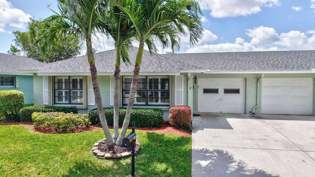 Photo of 9800 Tabebuia Tree Drive #A, Boynton Beach, FL 33436 (MLS # R11140283)