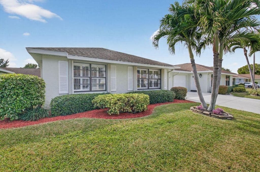 Photo of 9800 Tabebuia Tree Drive #A, Boynton Beach, FL 33436 (MLS # R11140283)