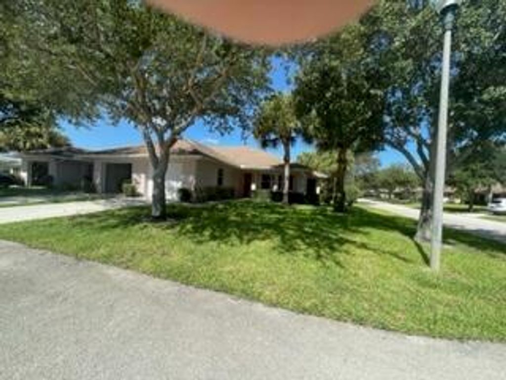 Photo of 1767 N Dovetail N Drive Dr, Fort Pierce, FL 34982 (MLS # R10822336)