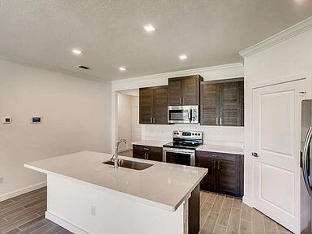 Photo of 1343 NE White Pine Terrace, Jensen Beach, FL 34957 (MLS # R11109851)