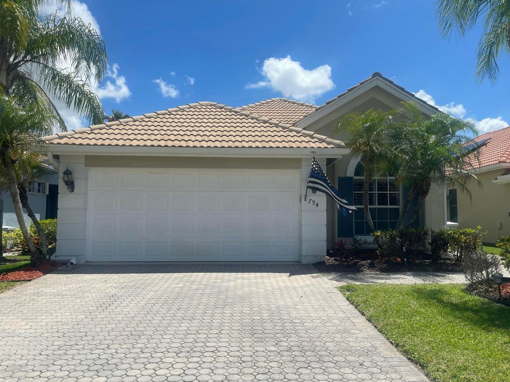 Photo of 917 SW Munjack Circle, Port Saint Lucie, FL 34986 (MLS # B26022188)