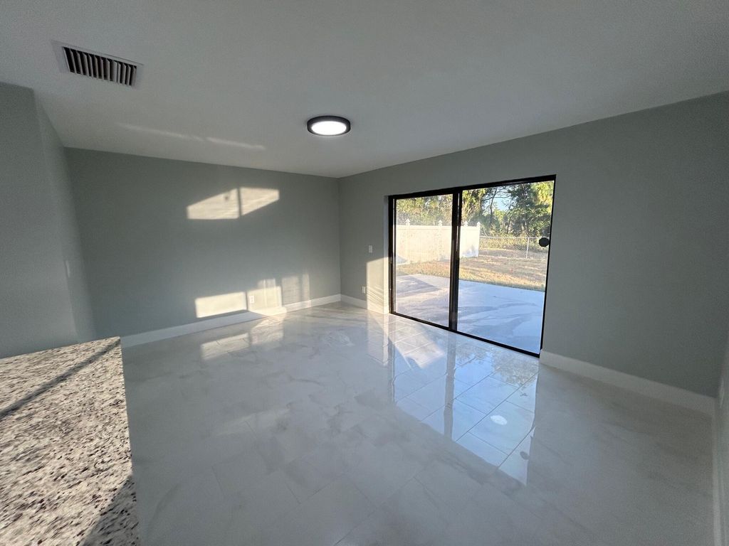 Photo of 1140 SE St Lawrence Way, Stuart, FL 34997 (MLS # R10980337)