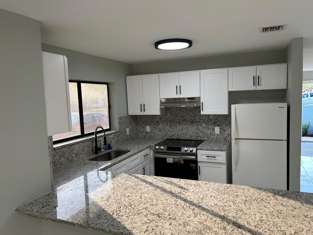 Photo of 1140 SE St Lawrence Way, Stuart, FL 34997 (MLS # R10980337)