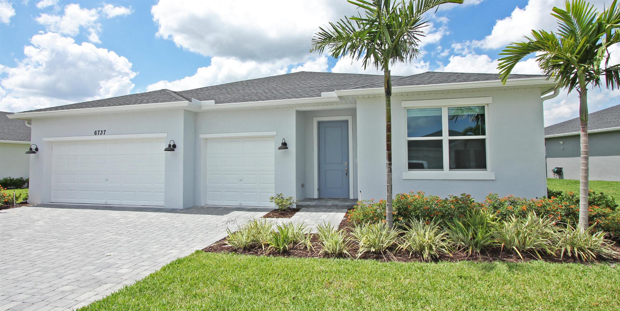 ** $10,000 Seller Closing Cost Incentive ** Quick move-in to this almost brand new, energy-efficient, 4BR/3BA, 2792sf CBS home on large .23 acre fenced, lakefront lot in highly-desired Brystol at Wylder. Barely lived in, this Meritage-built home has tons of upgrades including Luxury Vinyl Plank and tile flooring throughout (no carpet), Quartz countertops, luxury bathrooms with Super Shower option in Primary Bath along with its gigantic Primary closet, Impact glass in all doors/windows, newly epoxied 3-car garage, Washer and Dryer, EV charger, new Gutters, and so much more! HOA covers lawn maintenance, cable, and resort-style amenities that are just a short walk away. Large, covered lanai overlooking the beautiful lake and newly-fenced back yard.