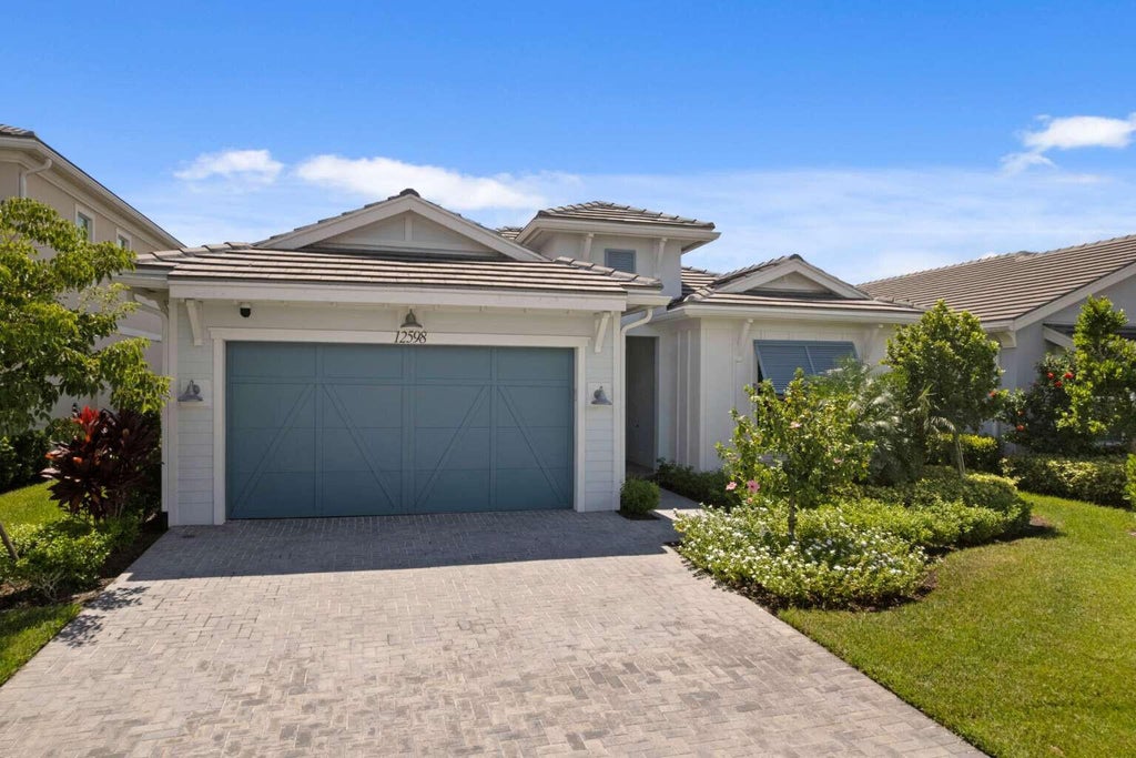 Photo of 12598 NAUTILUS Circle, Palm Beach Gardens, FL 33412 (MLS # B26075996)
