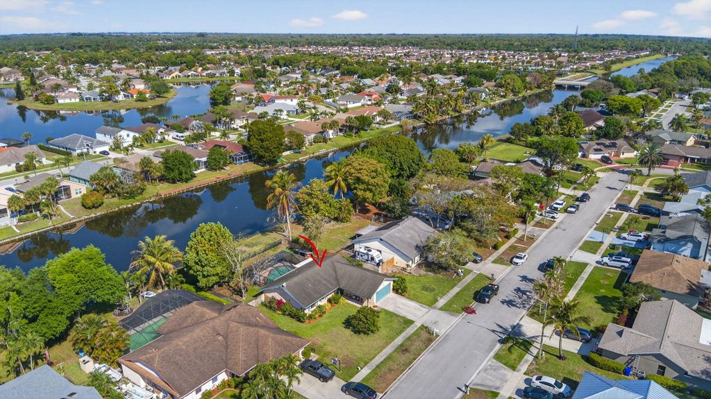 Photo of 132 Parkwood Drive, Royal Palm Beach, FL 33411 (MLS # B26008502)