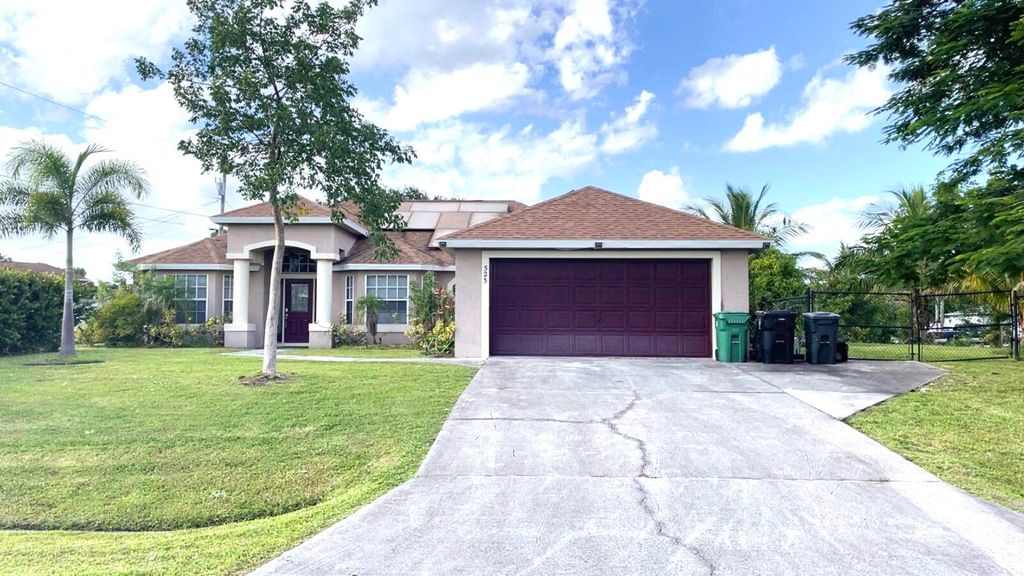 Photo of 523 SW Gale Lane, Port Saint Lucie, FL 34953 (MLS # B26023091)