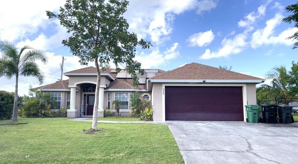 Photo of 523 SW Gale Lane, Port Saint Lucie, FL 34953 (MLS # B26023091)