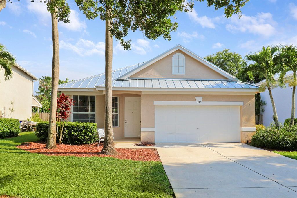 Photo of 3130 SW Solitaire Palm Drive, Palm City, FL 34990 (MLS # R10994692)