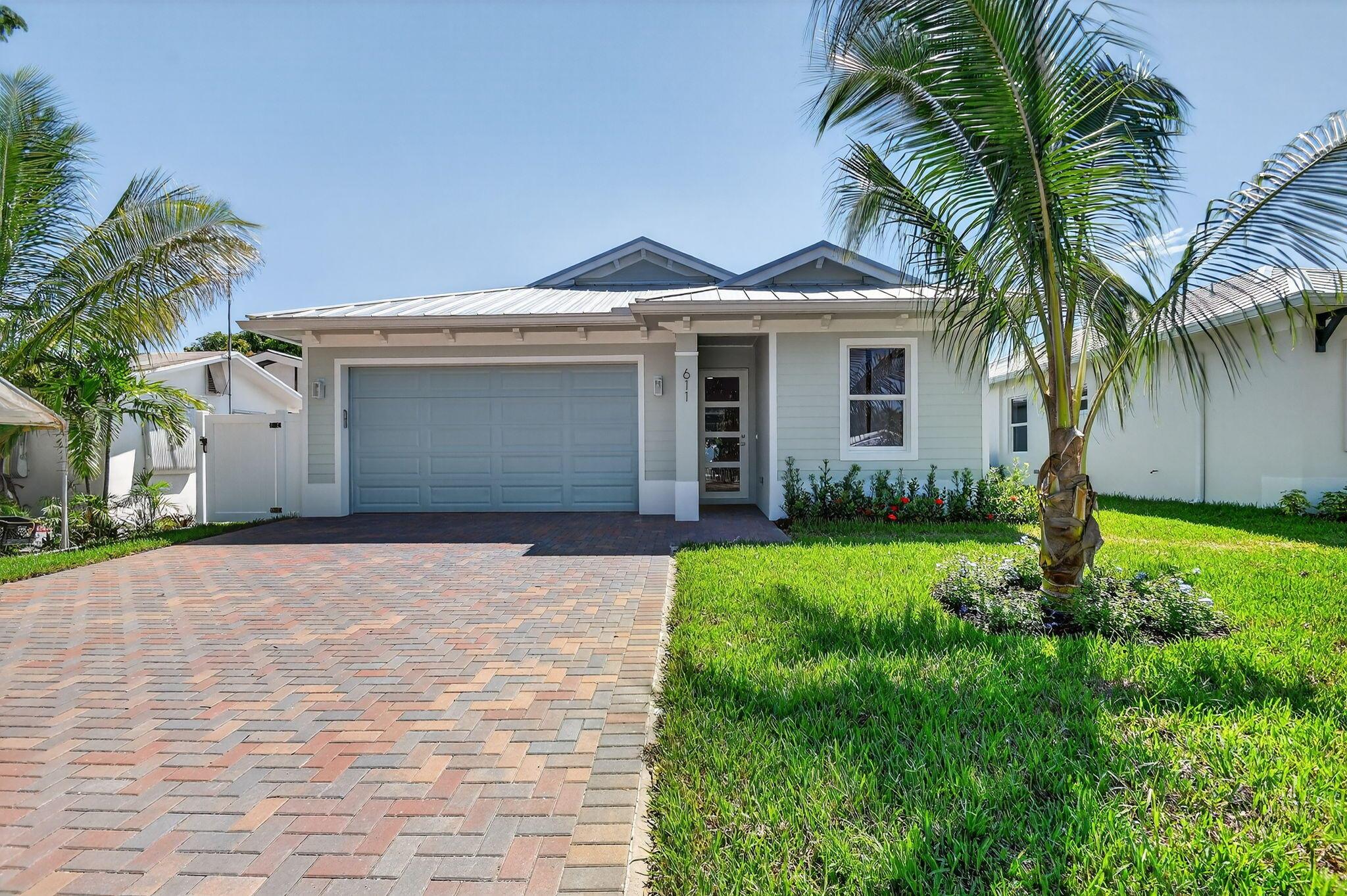 5 NEW CONSTRUCTION HOMES IN JUPITER.Welcome to this spacious 4-bedroom, 3-bathroom home designed with families in mind. Featuring two master bedrooms, this layout is perfect for multi-generational living, giving everyone their own comfort and privacy. The home is built for both style and peace of mind, with a durable metal roof, impact windows, and ceramic tile throughout, making it easy to maintain and perfect for busy households.