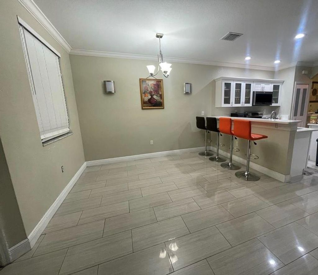 Photo of 6050 SW 19th Ct, North Lauderdale, FL 33068 (MLS # F10490447)