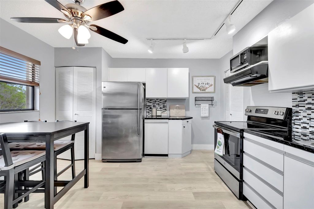 Photo of 1717 Hammock Boulevard #1717, Coconut Creek, FL 33063 (MLS # F10406053)