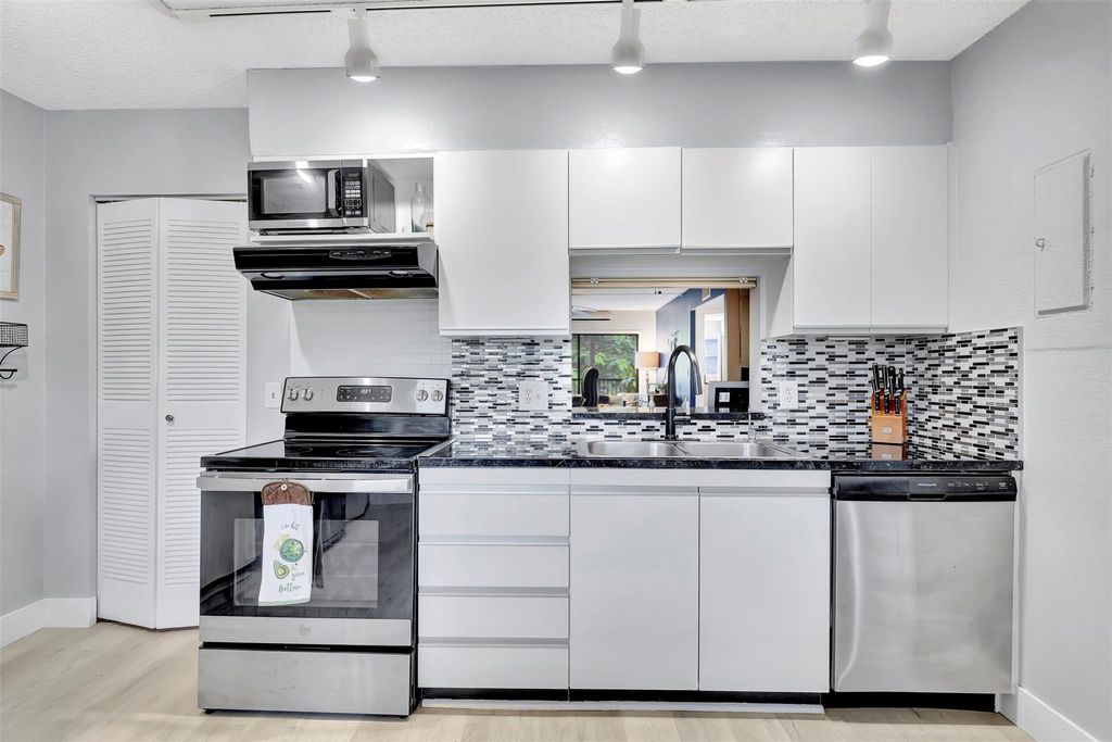 Photo of 1717 Hammock Boulevard #1717, Coconut Creek, FL 33063 (MLS # F10406053)