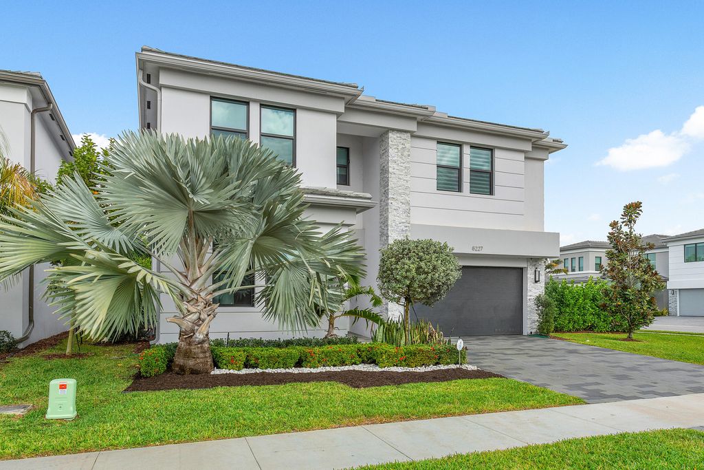 Photo of 8227 Oceanus Drive, Boca Raton, FL 33496 (MLS # R10966271)