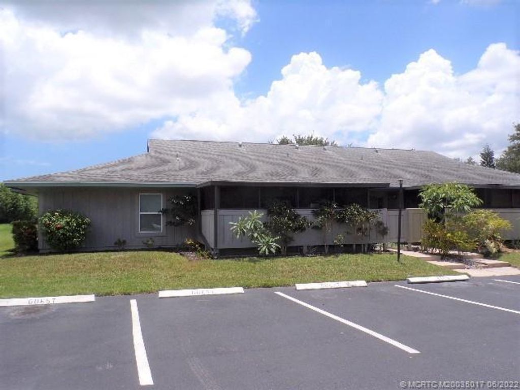 Photo of 4077 NW Cinnamon Tree Circle Cir, Jensen Beach, FL 34957 (MLS # R10819146)