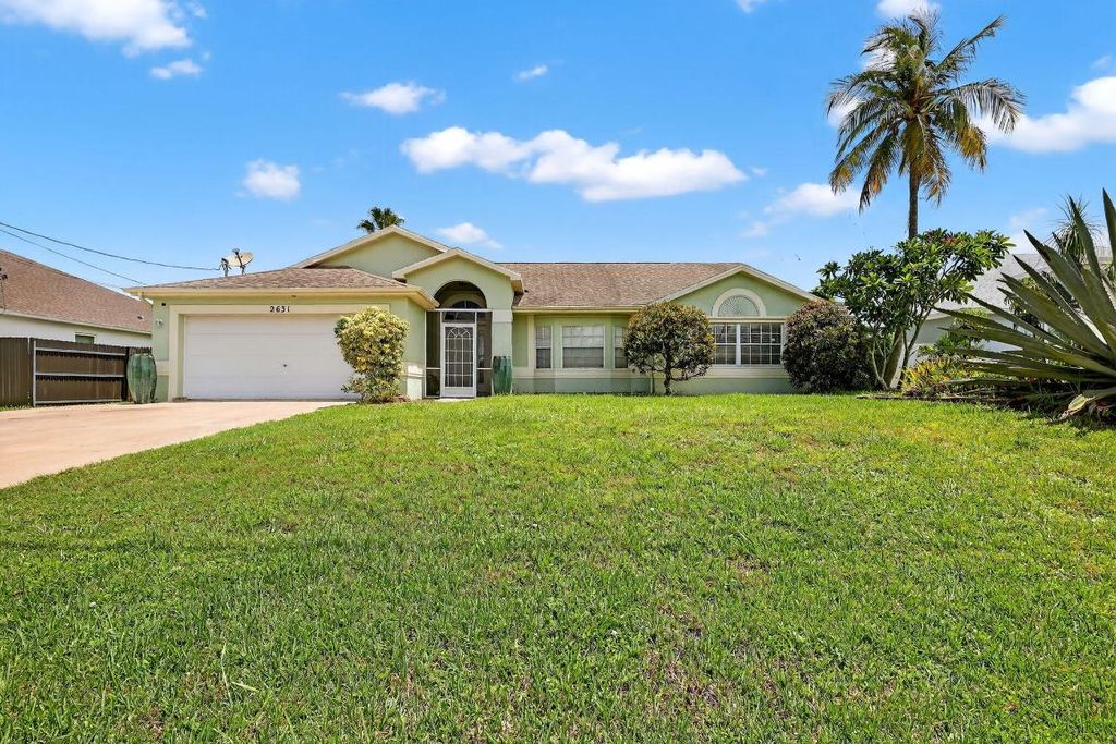Photo of 2631 SW Fair Isle Road, Port Saint Lucie, FL 34987 (MLS # R11157940)