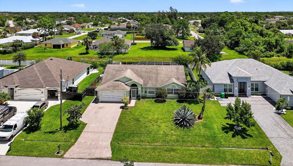 Photo of 2631 SW Fair Isle Road, Port Saint Lucie, FL 34987 (MLS # R11157940)