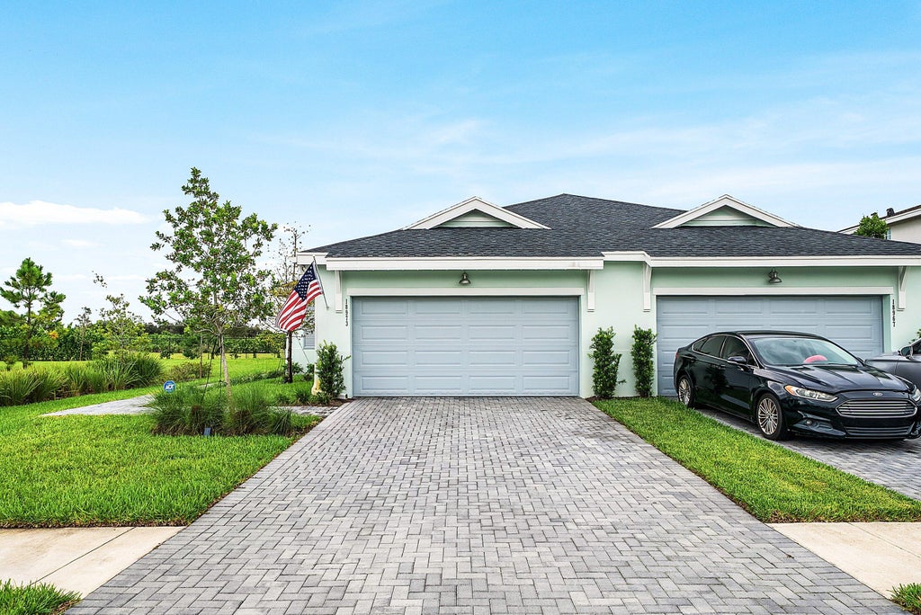 Photo of 18973 WOOD STORK Way, Loxahatchee, FL 33470 (MLS # B26077190)