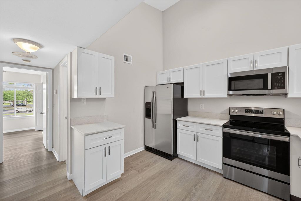 Photo of 6327 Chasewood Drive #E, Jupiter, FL 33458 (MLS # B26015541)