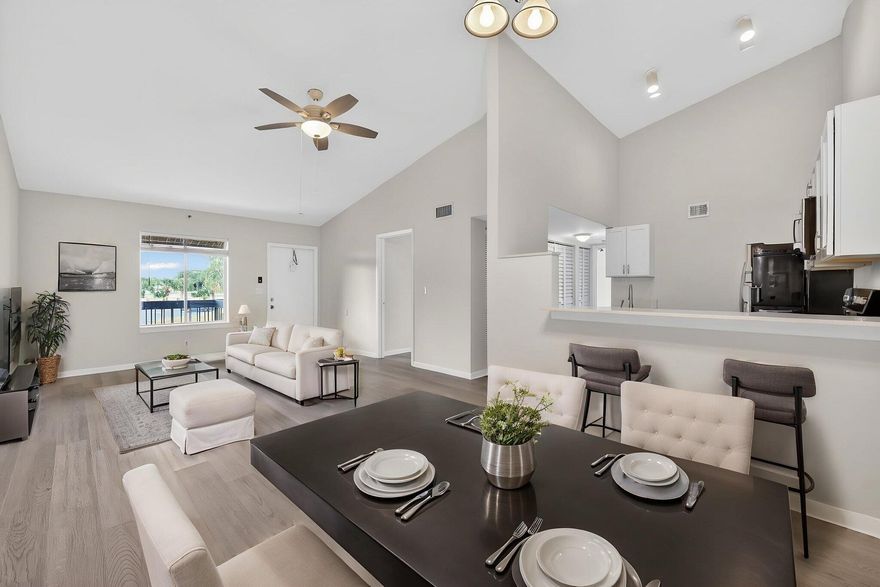 Remodeled, GORGEOUS move-in ready second-floor condo in the heart of Jupiter.  Bright, open layout with modern finishes and vinyl plank flooring (no carpet), quartz countertops and stainless steel appliances. Enjoy your evening breezes on the spacious screened balcony, with clubhouse, pool, tennis courts and a convenient car wash just steps away. Minutes to I-95/Turnpike, beaches, golf, waterfront dining, Roger Dean Stadium, The Maltz Theatre, and top-rated schools. Pickups and motorcycles allowed — an opportunity to embrace the relaxed Jupiter lifestyle.  Sewer, water and trash included in the rent.
