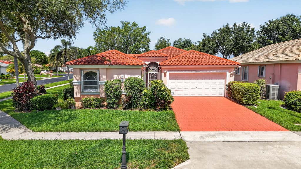 Photo of 12663 CORAL LAKES Drive, Boynton Beach, FL 33437 (MLS # B26065482)
