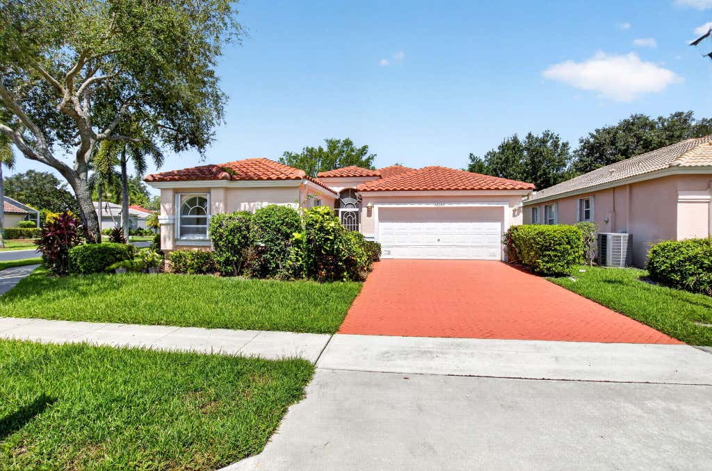 Photo of 12663 CORAL LAKES Drive, Boynton Beach, FL 33437 (MLS # B26065482)