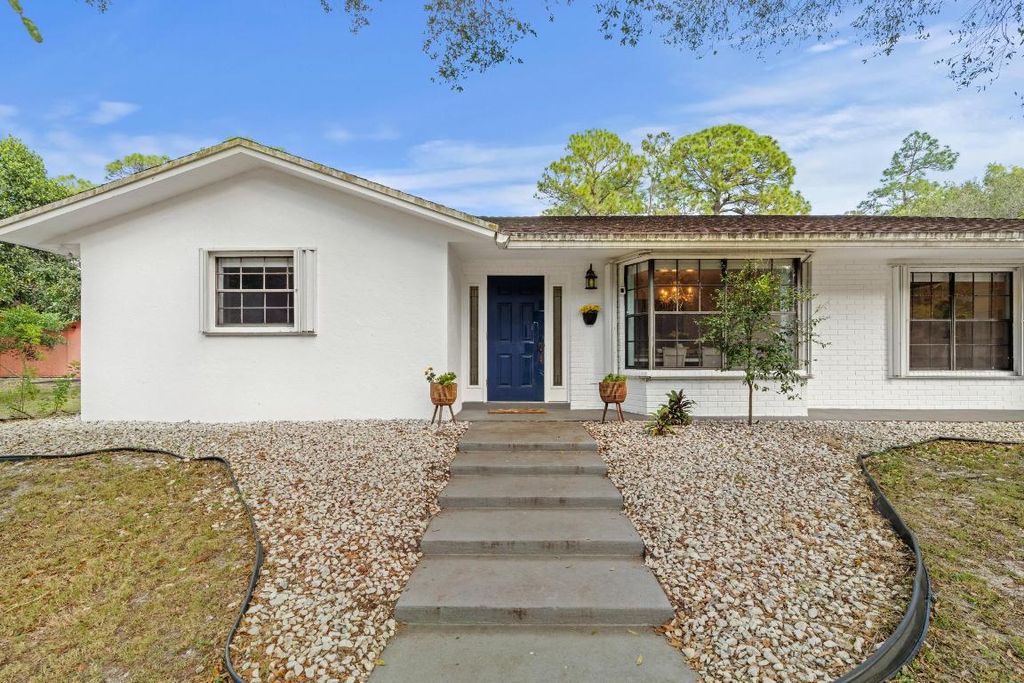 Photo of 14817 Snail Trl, Loxahatchee Groves, FL 33470 (MLS # R11151011)